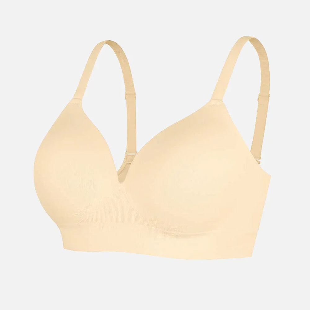 Sieviešu bezšuvju krūšturis ar koriģējošu efektu un mīkstu audumu – neredzams zem apģērba, uz balta forna, produkta attēls